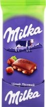 Шоколад Milka с цельными лесными орехами 90 г Шоколад Milka с цельными лесными орехами 90 г